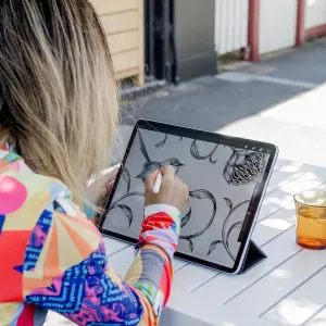 Paperlike screen protector with paper-like feel on an iPad, used outdoors for precise Apple Pencil drawing